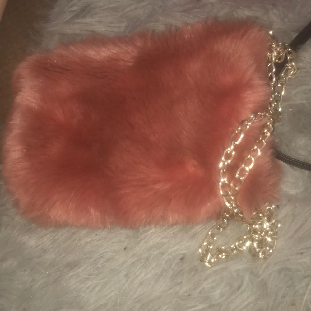 Fury clutch/ wristlet bag gently used